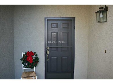 Property Photo. Inviting front porch. Screen door