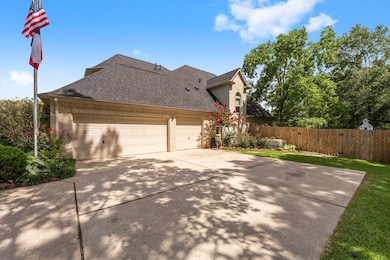 Enjoy a large driveway with a three car garage!