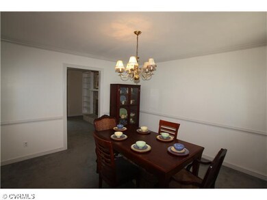 Dining Room - The Formal Dining Room flows comfort