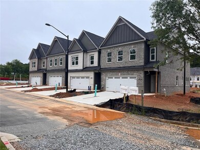 Beautiful four side brick home.  Two car oversized garage w one large door (WIFI).Subject property is the end unit to the right.