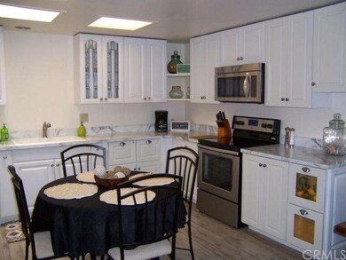 View showing Glass Doors and corner shelving 