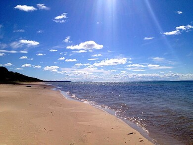 Stroll sandy Lake Michigan beaches close