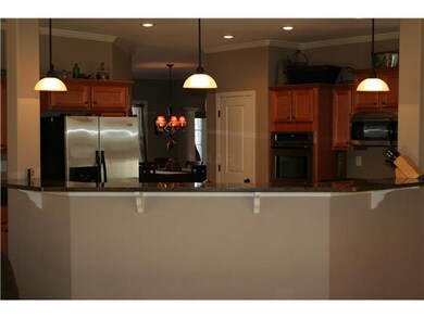 Kitchen with a nice breakfast bar area