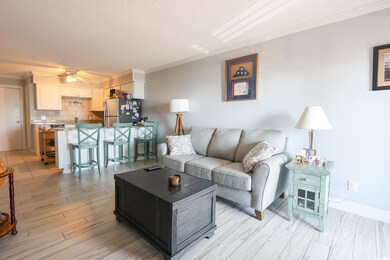 Living area featuring light wood-style flooring, o