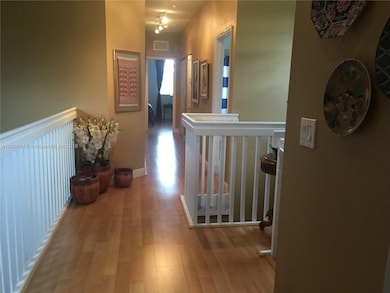 Upstairs hallway leading to master bedroom, master