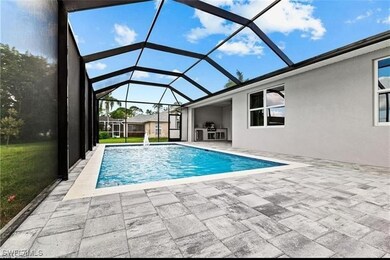 Swimming pool featuring a patio and a lanai