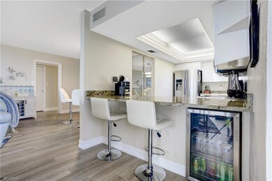 Breakfast bar and beverage fridge.