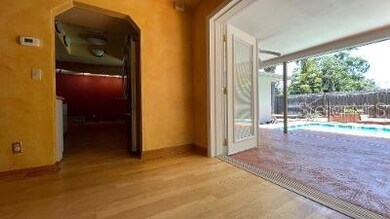 Dining room with doors to lanai and pool area