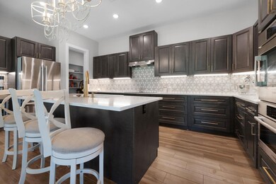 Kitchen featuring appliances with stainless steel