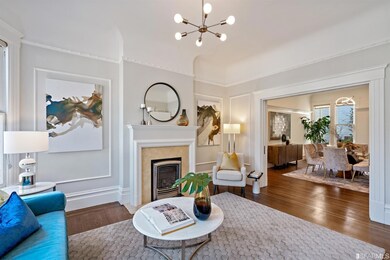 Details include newly refinished floors on all levels with inlaid oak floors, crown moldings, recessed and custom lighting, soaring coved ceilings, built-in speakers, and new interior paint