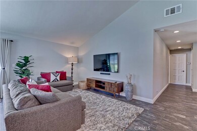 Family room opening to kitchen and dining area...stunning floors!