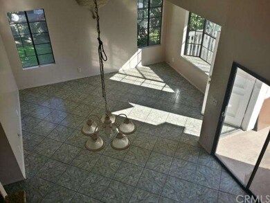 Spacious living room with plenty of natural light.