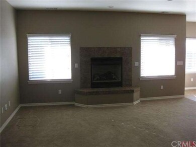 Living room with gas fireplace.