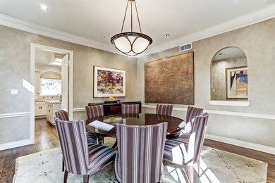 Dining room with pass through from the wet bar.