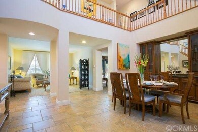 View from entry through Dining room to Living room