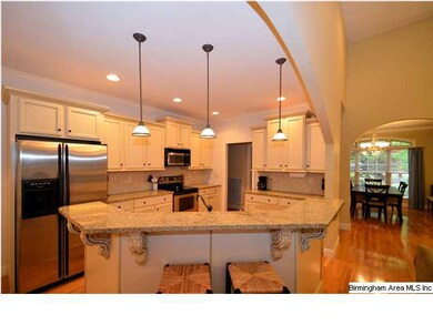 Wonderfully open kitchen with stainless appliances