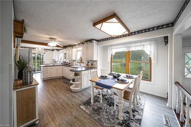 Eat in kitchen with view of the beautifully landsc