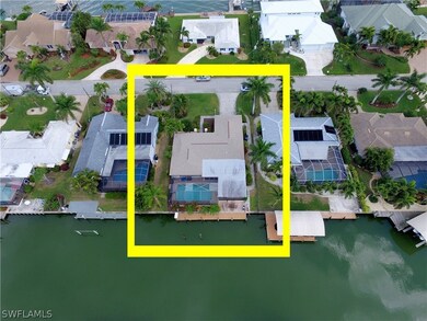 AERIAL VIEW SHOWING DOCK AND POOL AREAS