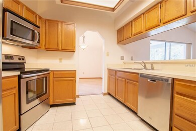 Kitchen features solid wood cabinets