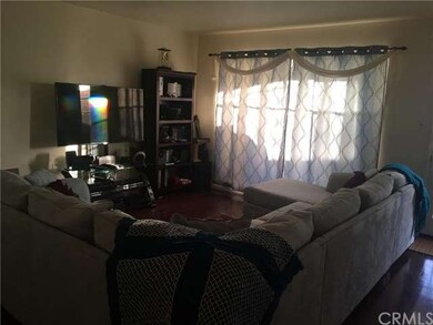 Living room with large, beautiful window that has 