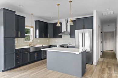 kitchen and hall leading to bedrooms