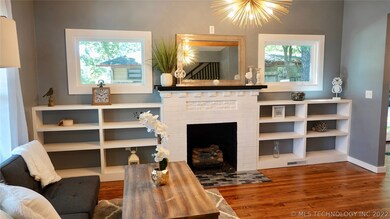 Fireplace and lots of storage for books, games or