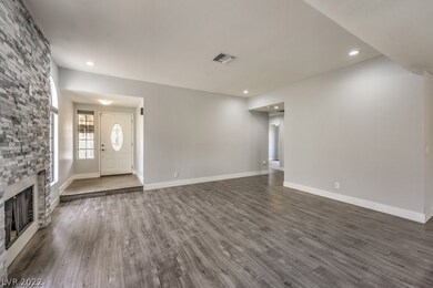 Great room looking from the kitchen and bedrooms l