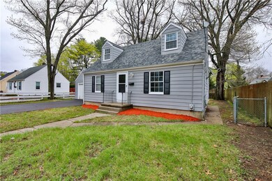 Exterior - side view and open gate to backyard