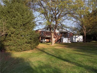 Exterior Back. NICE WIDE AND DEEP REAR YARD.