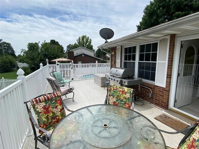 Lounge on your vinyl deck off of kitchen
