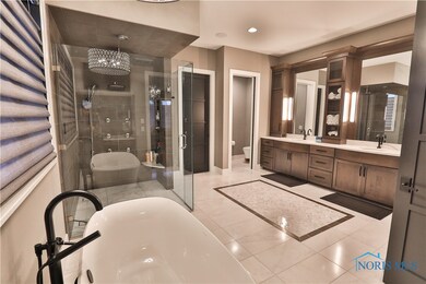 Heated Marble Floors with Herringbone Inlay in Mas