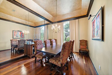 Formal Dining room with coffered ceiling.