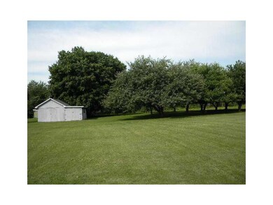 Exterior Side View. storage shed and...
