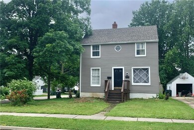 Front of home with sidewalks