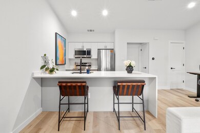 Kitchen with appliances with stainless steel fini