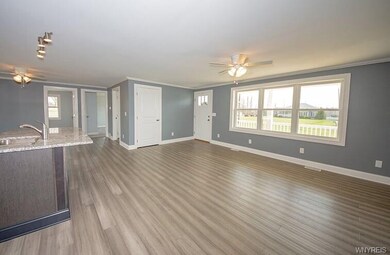 Beautiful Open Concept Living Space. Engineered Bamboo Hardwood Flooring.