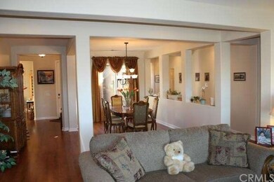 The beautiful wood floors and dramatic open design