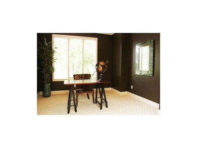 Formal dining room or office with glass pane pocke