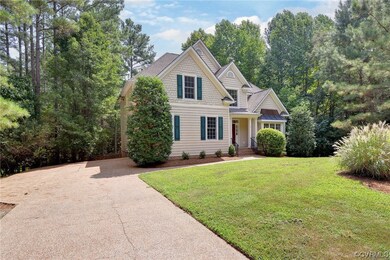 Craftsman-style home with a front yard