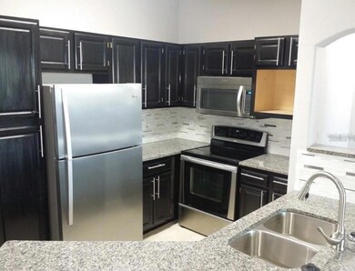 3344 Corona Village Way unit 303, Orlando, FL 32835 - photo 4