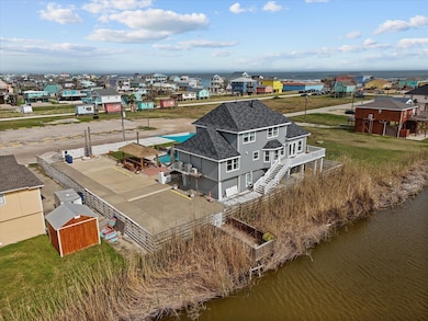 This waterfront home features a spacious deck with