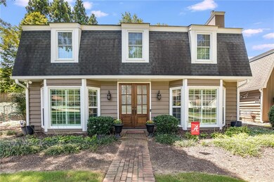 Beautifully refreshed landscaping creates a warm welcome.