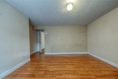 First Fl bedroom or use as a living room. Approx. size 13'x13'.