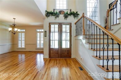 Grand 2-story foyer is bright and open