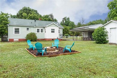 BRAND NEW OUTDOOR AREA complete with FIREPIT!  Loo