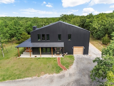 Striking exterior and pull-through 3+ car garage
