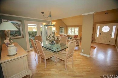 The formal dining room features newer window and f