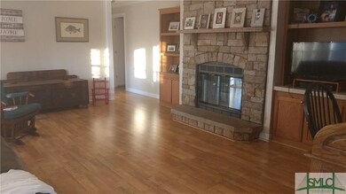 Family Room with Wood Burning Fireplace