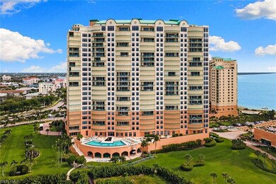 View of apartment building / complex with a water view