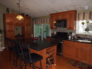 Beautiful kitchen with Corian counter tops.